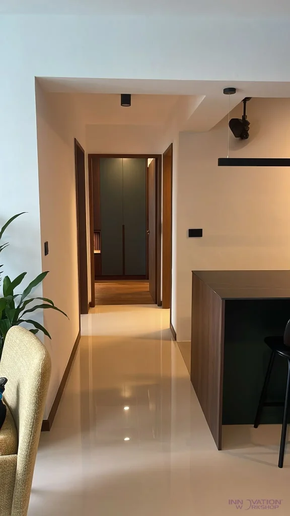 Condo renovation West Coast – hallway leading to a built-in wardrobe