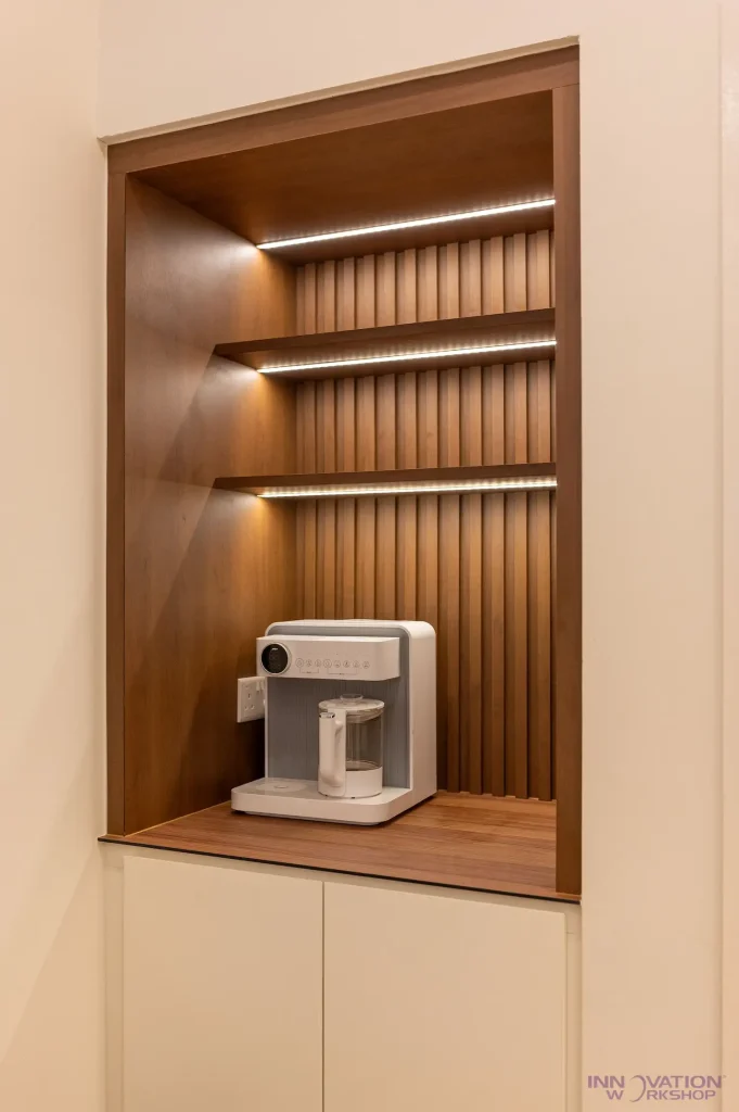 Beauty salon renovation Pasir Ris – slatted pantry niche with LED-lit shelves and storage cabinet